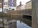 Westzijde brug gezien vanaf de Ringdijk naar de Transvaalkade
<br/>
Corrie Groen- Pickhard, 2014-12-26